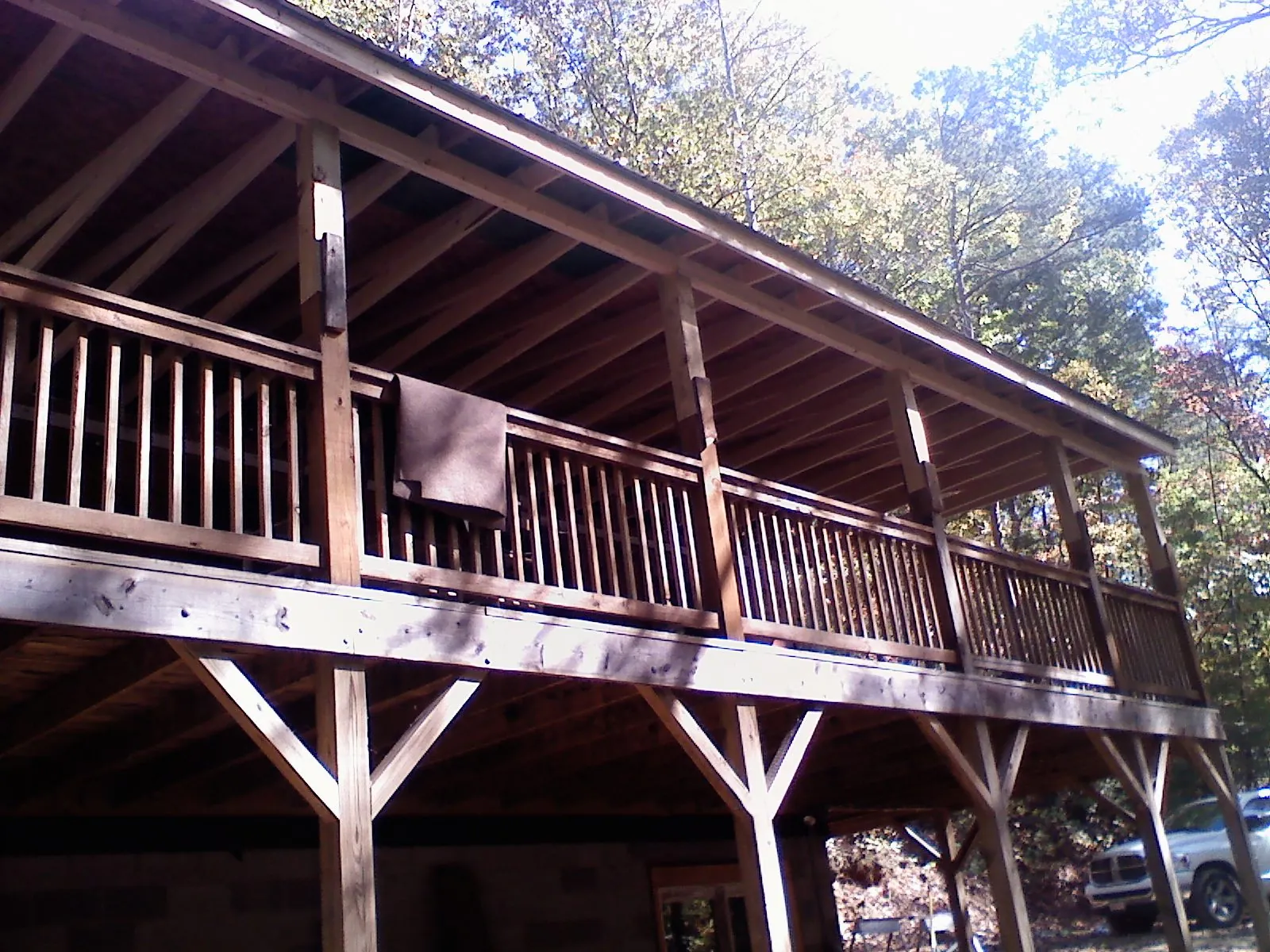 Timber framing under a new elevated porch and deck — Roof Leak Repair in Clara City by Roofing Brothers